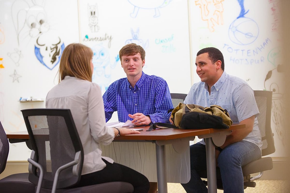 Candid photo of students talking