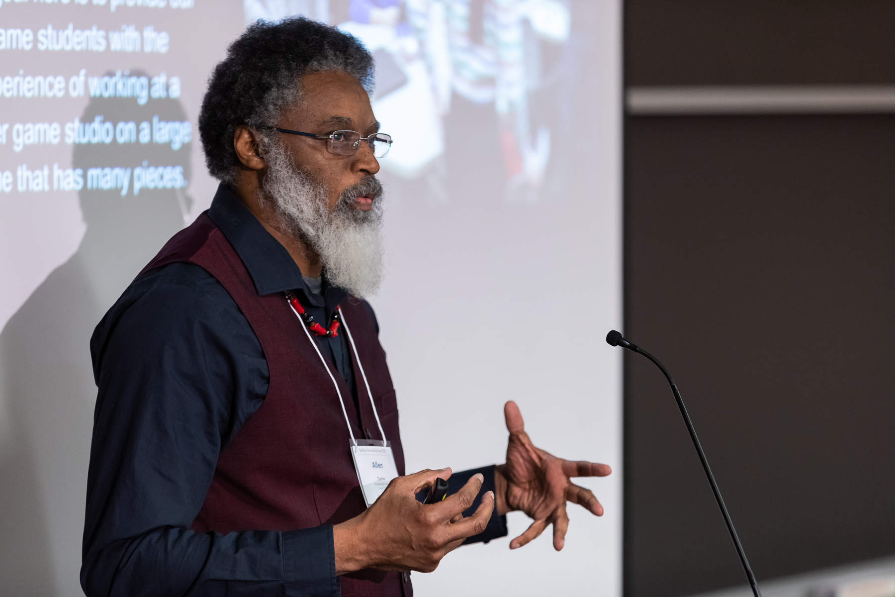 Man speaking at podium.