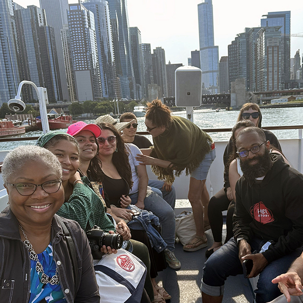 faculty and students on the Chicago River